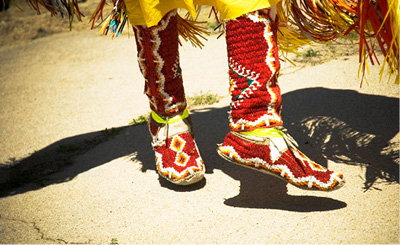 Dancing feet in beaded moccasins
