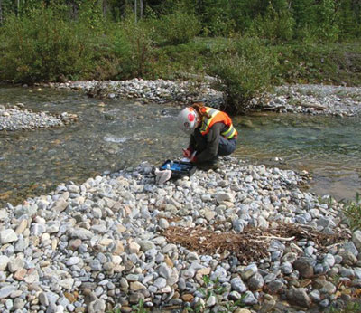 Inspector taking a water sample