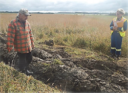 NEB inspector onsite with a landowner
